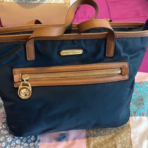 Michael Kors navy blue and brown handle gently used tote